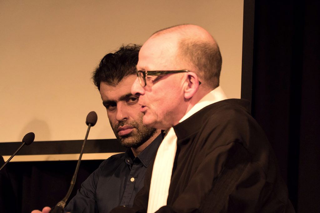 Ehsan Fardjadniya (Ali J) & Hans van Zundert (Ali's lawyer) at "Refugee on Trial" performance art by Ehsan Fardjadniya